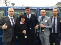 people in formal wear beside taxi in Scunthorpe